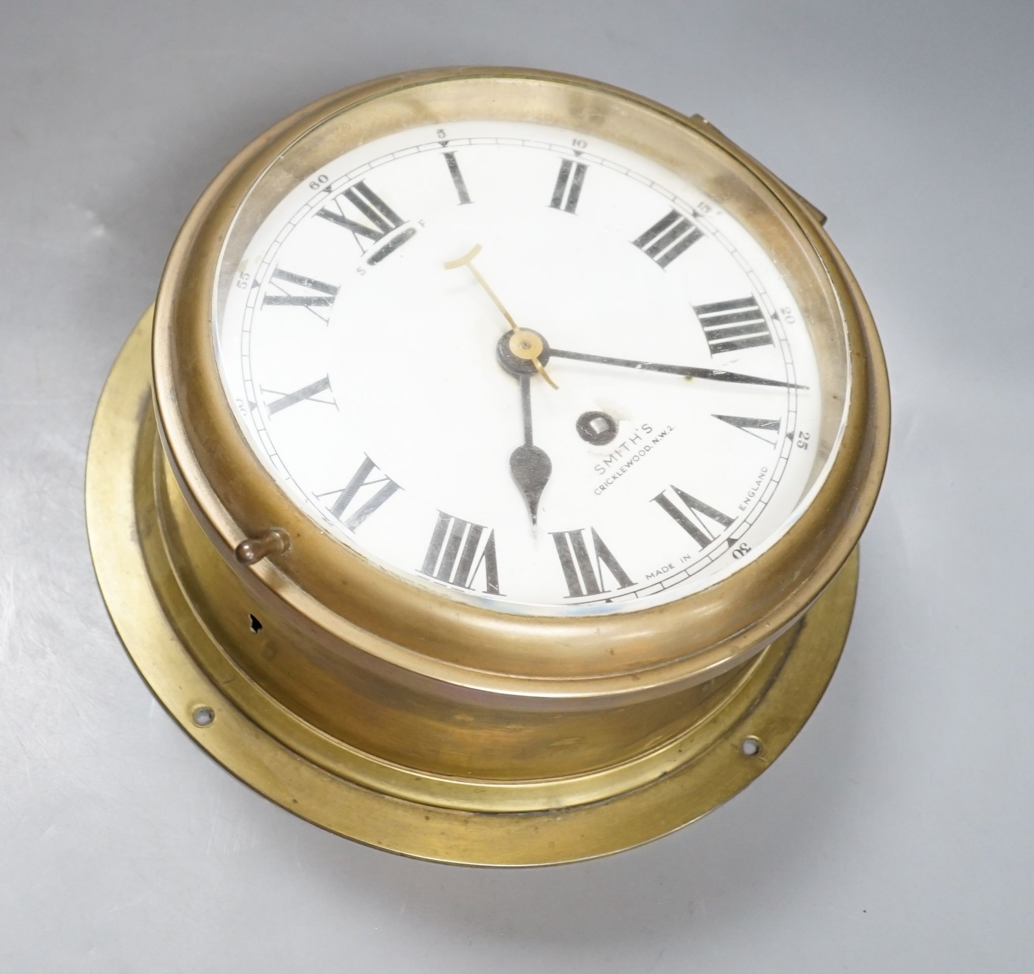 A Smith's brass bulkhead timepiece